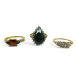 A group of of three 9ct gold dress rings, comprising a pear shaped blue stone ring, 18.57mm at