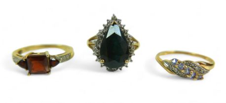 A group of of three 9ct gold dress rings, comprising a pear shaped blue stone ring, 18.57mm at