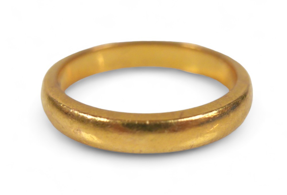 A 22ct yellow gold band ring, 6 grams, size O, 21mm by 3.5mm external.