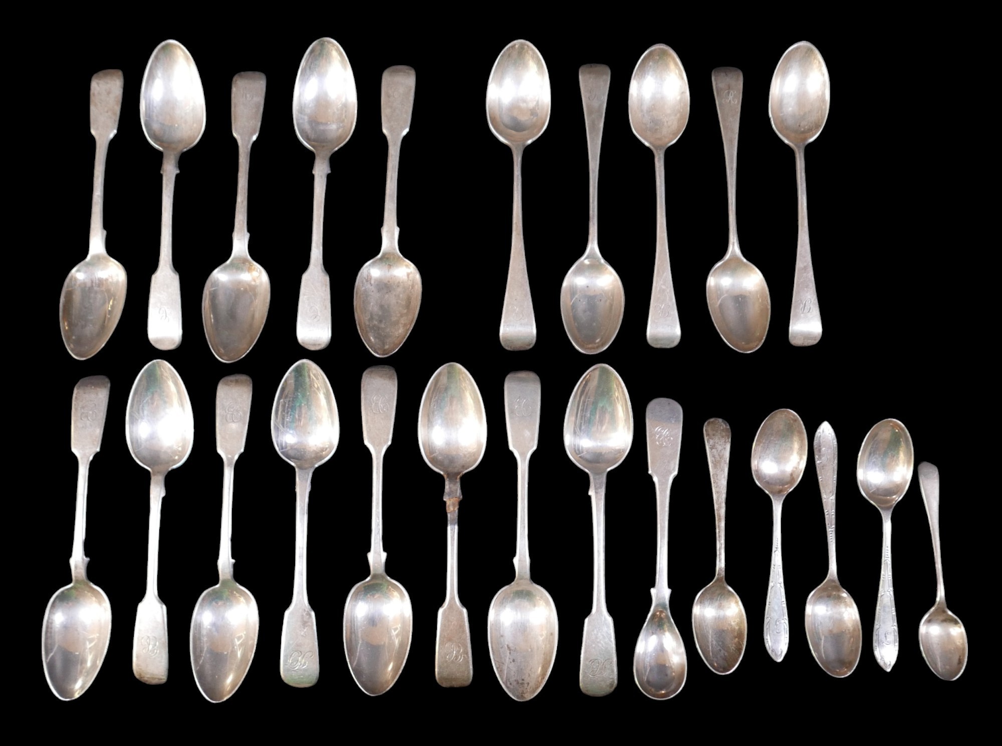 A collection of silver tea spoons, comprising five Victorian silver teaspoons by WH for William