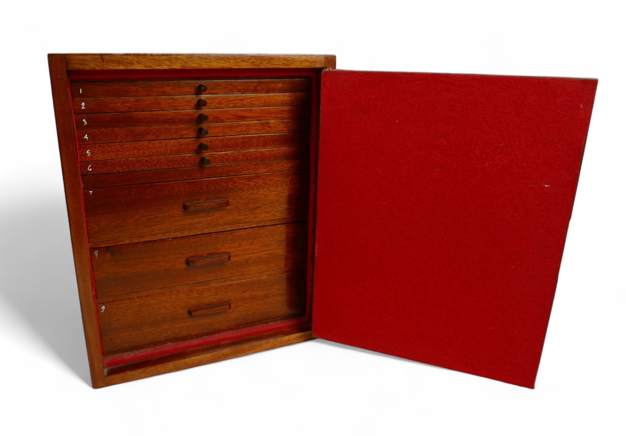 A collection of mainly English coins and other items contained in a nine drawer mahogany