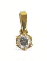 An 18ct yellow gold and diamond solitaire pendant, the round faceted cut stone approximately 0.5ct.