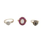 Three 9ct gold dress rings, comprising an opal and ruby daisy ring, the central oval opal 8 by