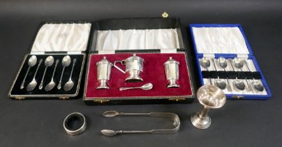 A collection of assorted silver items, to include two boxed sets of coffee spoons, a cruet set, a
