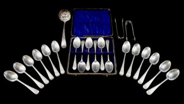 A set of twelve silver teaspoons London 1895/6 G.M.J. two silver nips and a solver sifter, and a