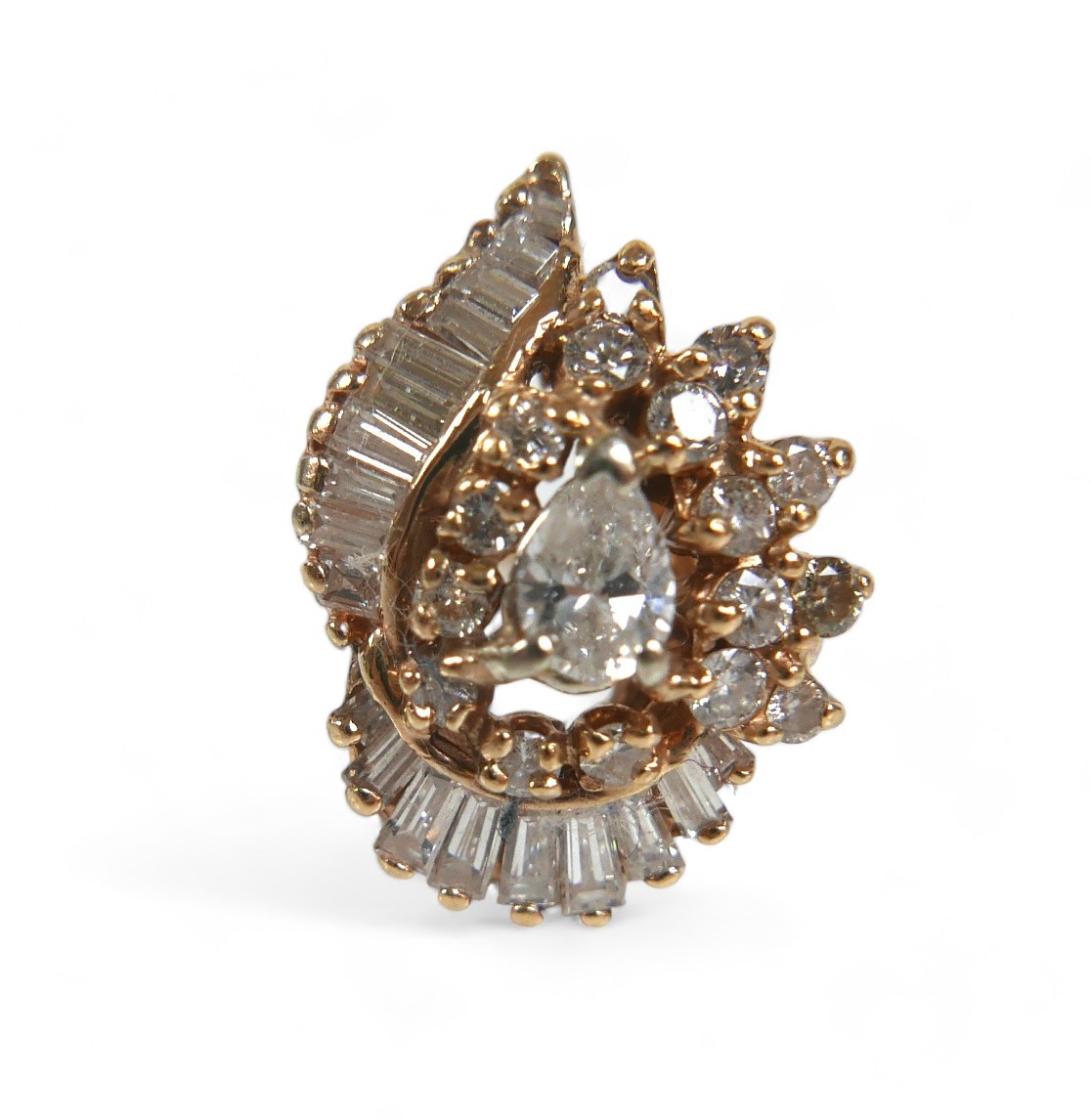 A 14ct yellow gold and diamond cluster dress ring, circa 1970s, set centrally with a pear cut