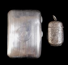 A silver vesta and a silver cigarette case, 67g/2.1 troy oz.