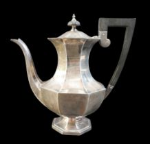 A silver coffee pot, Walker and Hall, Sheffield, 1922/3. 754g/24.2 troy oz, 24 by 13 by 23cm high.