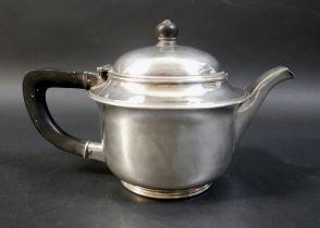 An Arts and Crafts style silver hammered teapot, by Hart Silversmiths - Guild of Handicraft,