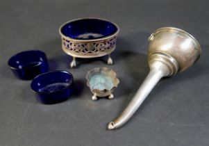A collection of silver, comprising two silver salts, a silver plated wine funnel and two blue
