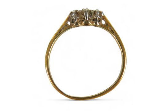 An 18ct gold and diamond three stone ring, maker RK & T, size O. - Image 4 of 5