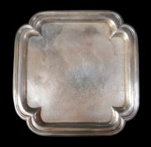 A George I silver tray, of square form with incuse corners and reeded rim, raised on four hoof feet,