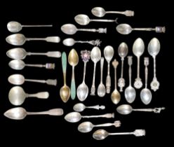 A small collection of silver teaspoons, comprising two Georg Jensen Danish silver teaspoons, one