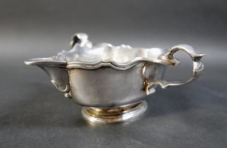 A Britannia standard silver double handle sauce boat, date letter k, maker G P. 428 gs/13.7 troy oz,