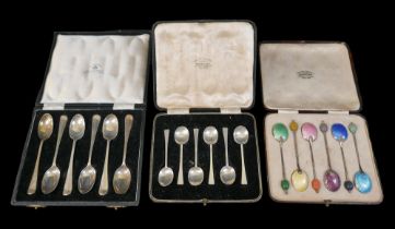 Three boxed sets of early to mid 20th century silver spoons, including a boxed set of silver