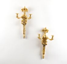 A PAIR OF LOUIS XVI STYLE GILT-METAL TWIN-LIGHT WALL APPLIQUÉS (2)