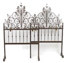 A PAIR OF WROUGHT IRON BED HEADBOARDS OR SCREENS (2)