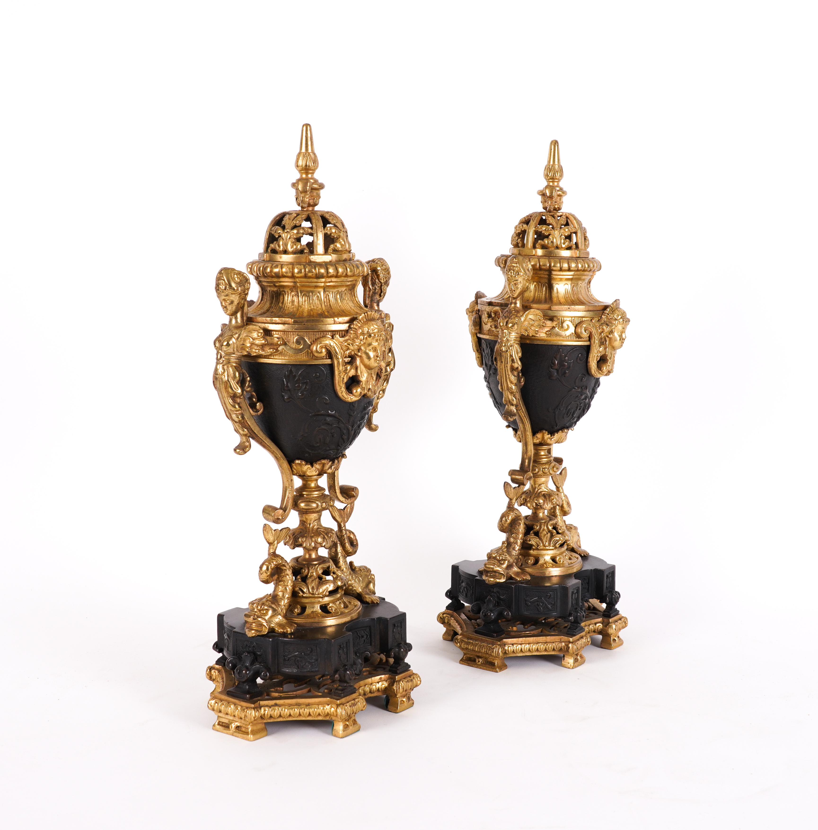 A PAIR OF REGENCE STYLE GILT AND PATINATED METAL ORNAMENTAL URNS OR PERFUME BURNERS (2)