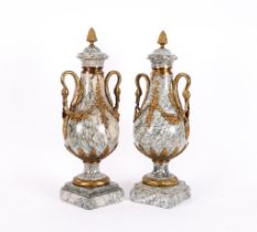 A PAIR OF LOUIS XVI STYLE GILT-METAL SWAN NECK MOUNTED CIPOLLINO MARBLE ORNAMENTAL URNS (2)