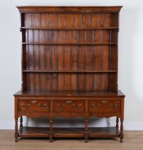 AN 18TH CENTURY OAK THREE DRAWER POT BOARD DRESSER