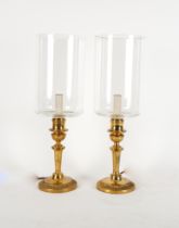 A PAIR OF GEORGE I STYLE GILT-BRASS CANDLESTICK TABLE LAMPS WITH STORM SHADES (2)