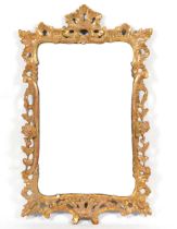 A GEORGE III GILT FRAMED SHAPED RECTANGULAR WALL MIRROR