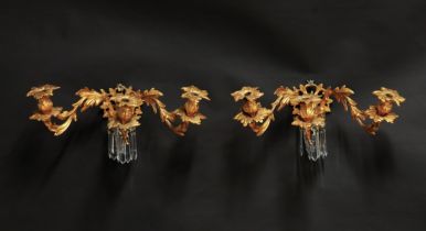 A PAIR OF GILT METAL ROCOCO STYLE THREE LIGHT WALL APPLIQUÉS (2)