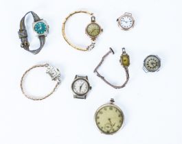 A GROUP OF EIGHT WATCHES (8)