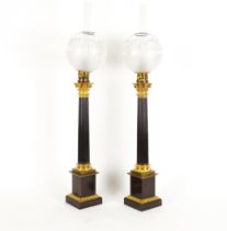 A PAIR OF FRENCH GILT AND PATINATED METAL CORINTHIAN COLUMN TABLE LAMPS (2)