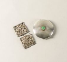 A SILVER POWDER COMPACT AND A SILVER TWO PIECE BUCKLE (2)