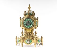 A FRENCH GREEN ENAMEL MOUNTED GILT METAL MANTEL CLOCK