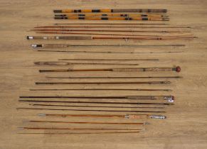 A LARGE COLLECTION OF SPLIT CANE FISHING RODS AND VARIOUS OTHER RODS INCLUDING BY HARDY BROS (18)