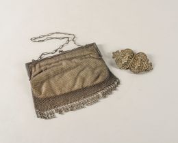 A STERLING MOUNTED LADY'S CHAIN MESH EVENING BAG AND AN ASIAN BUCKLE (2)
