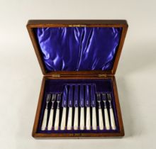A SET OF SIX PAIRS OF DESSERT OR FRUIT KNIVES AND FORKS