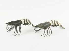 A PAIR OF BRONZE AND MOTHER-OF-PEARL LANGOUSTINES (2)