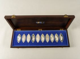 A SET OF TEN SILVER OVAL MEDALLIONS (10)