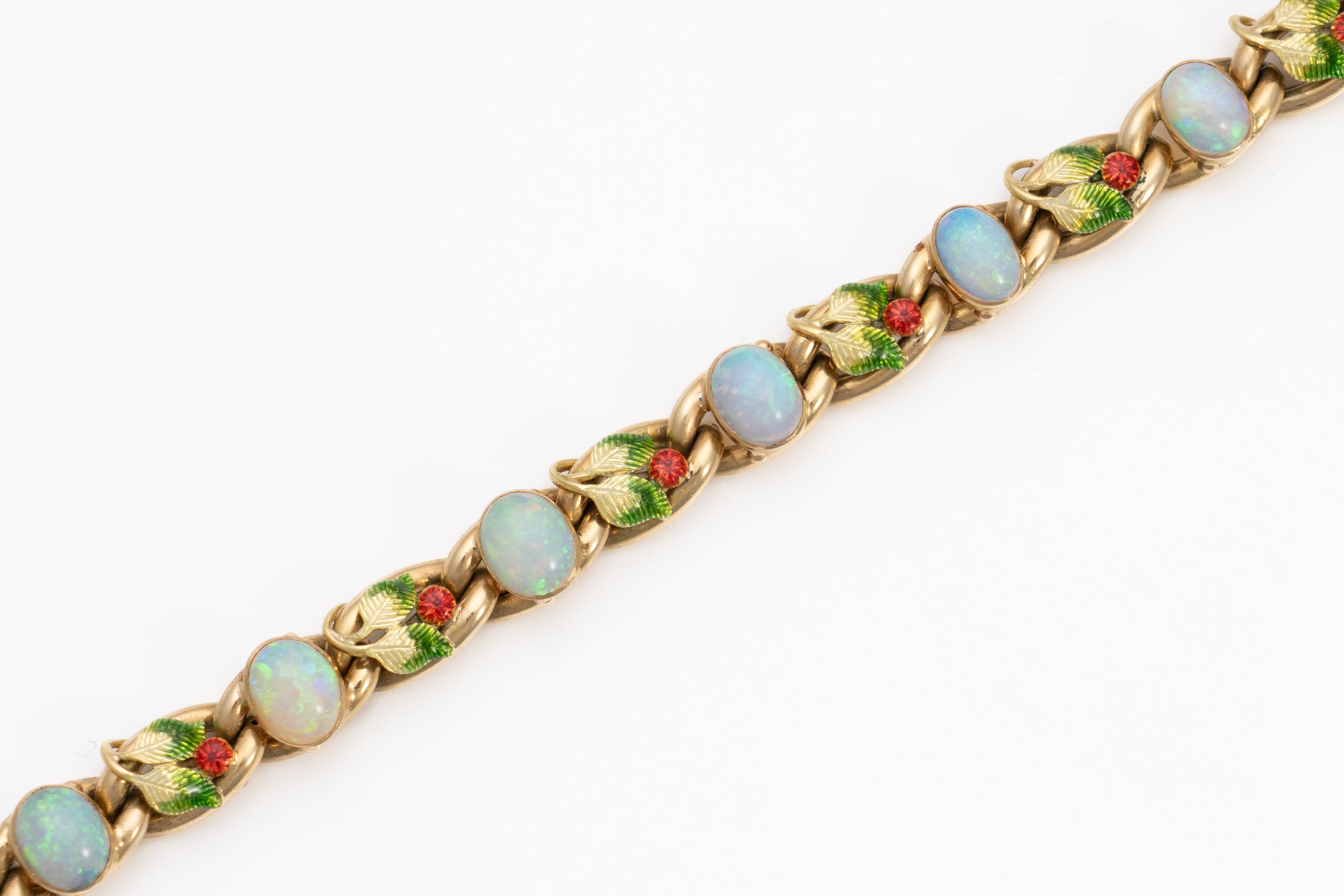 ATTRIBUTED TO MRS NEWMAN: A GOLD, OPAL AND ENAMEL BRACELET - Image 4 of 7