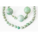 TWO JADEITE JADE BEAD NECKLACES (2)