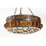 AN AUSTRIAN ARTS AND CRAFTS COPPER, AMBER AND MOTHER-OF-PEARL 'CHUNK GLASS' HANGING LIGHT SHADE