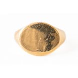 AN 18CT GOLD OVAL SIGNET RING