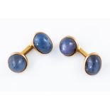 A PAIR OF STAR SAPPHIRE CUFFLINKS (2)