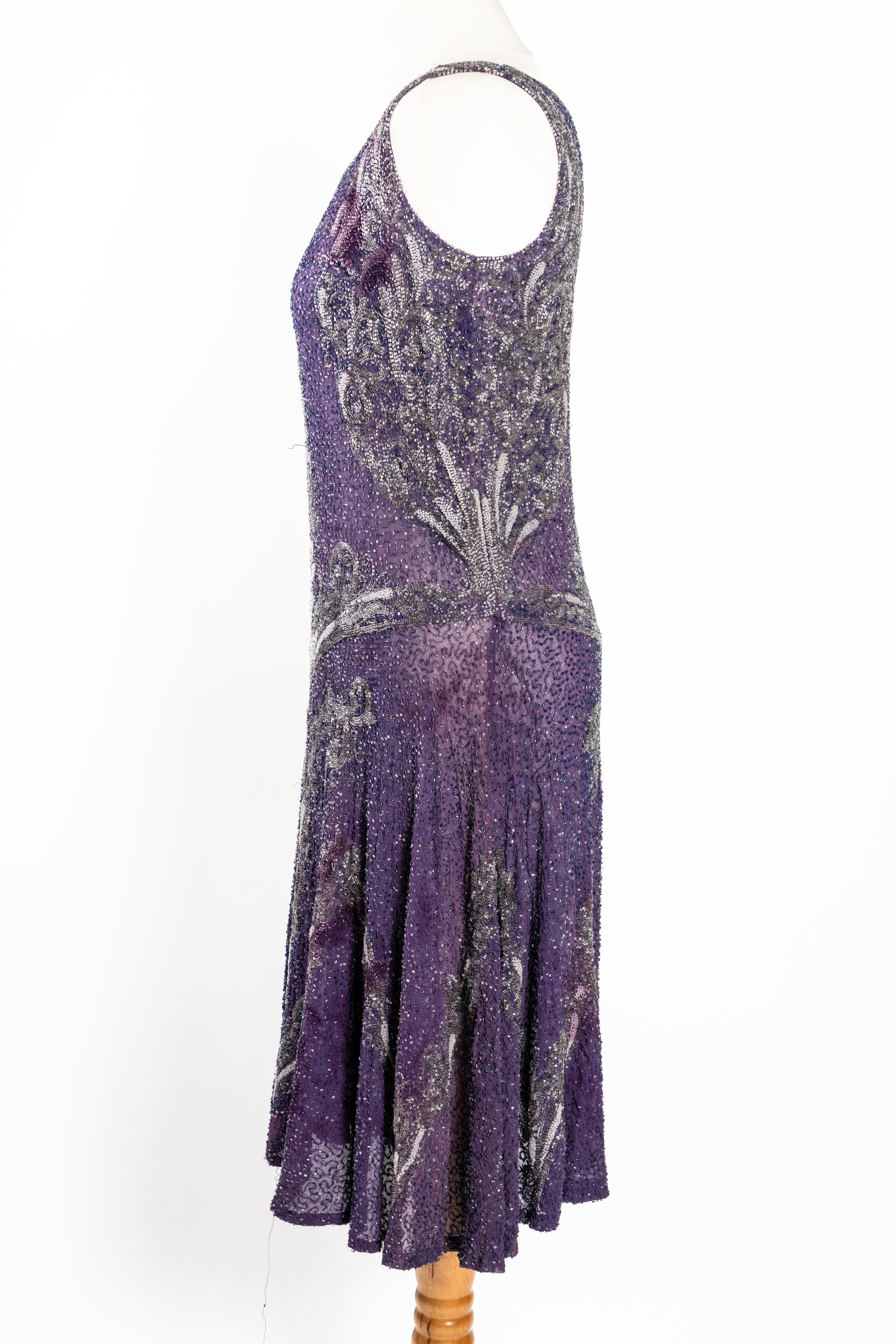 AN ART DECO PURPLE CHIFFON AND BEADED FLAPPER DRESS - Image 6 of 14