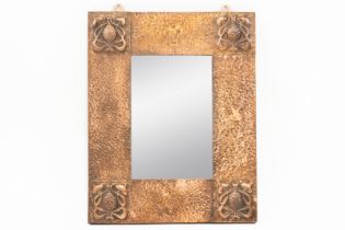 AN ART NOVEAU COPPER FRAMED REPOUSSÉ WALL MIRROR