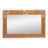 IN THE MANNER OF LIBERTY & CO; AN ARTS & CRAFTS COPPER FRAMED RECTANGULAR WALL MIRROR