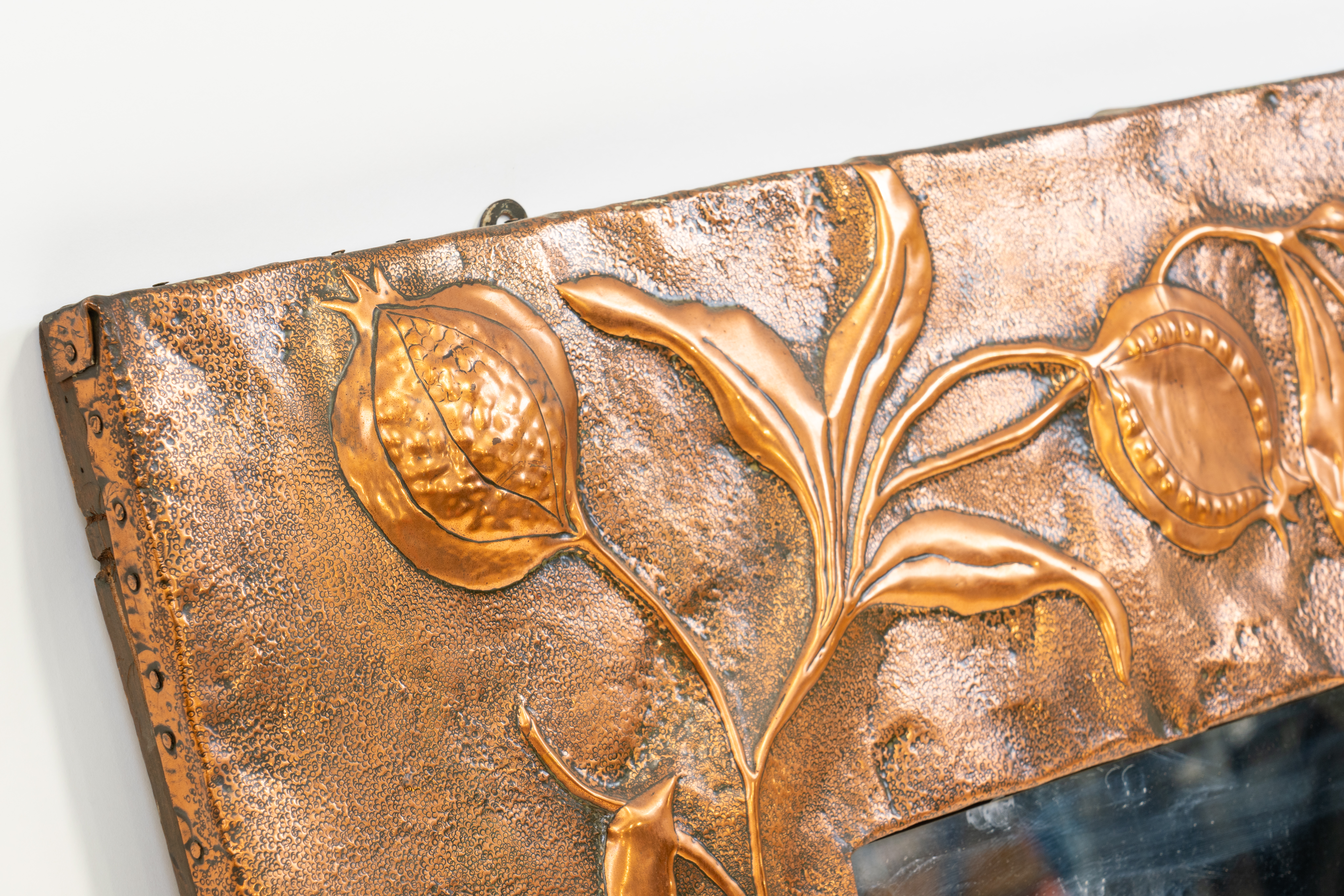 IN THE MANNER OF LIBERTY & CO; AN ARTS & CRAFTS COPPER SQUARE REPOUSSÉ WALL MIRROR - Image 11 of 13