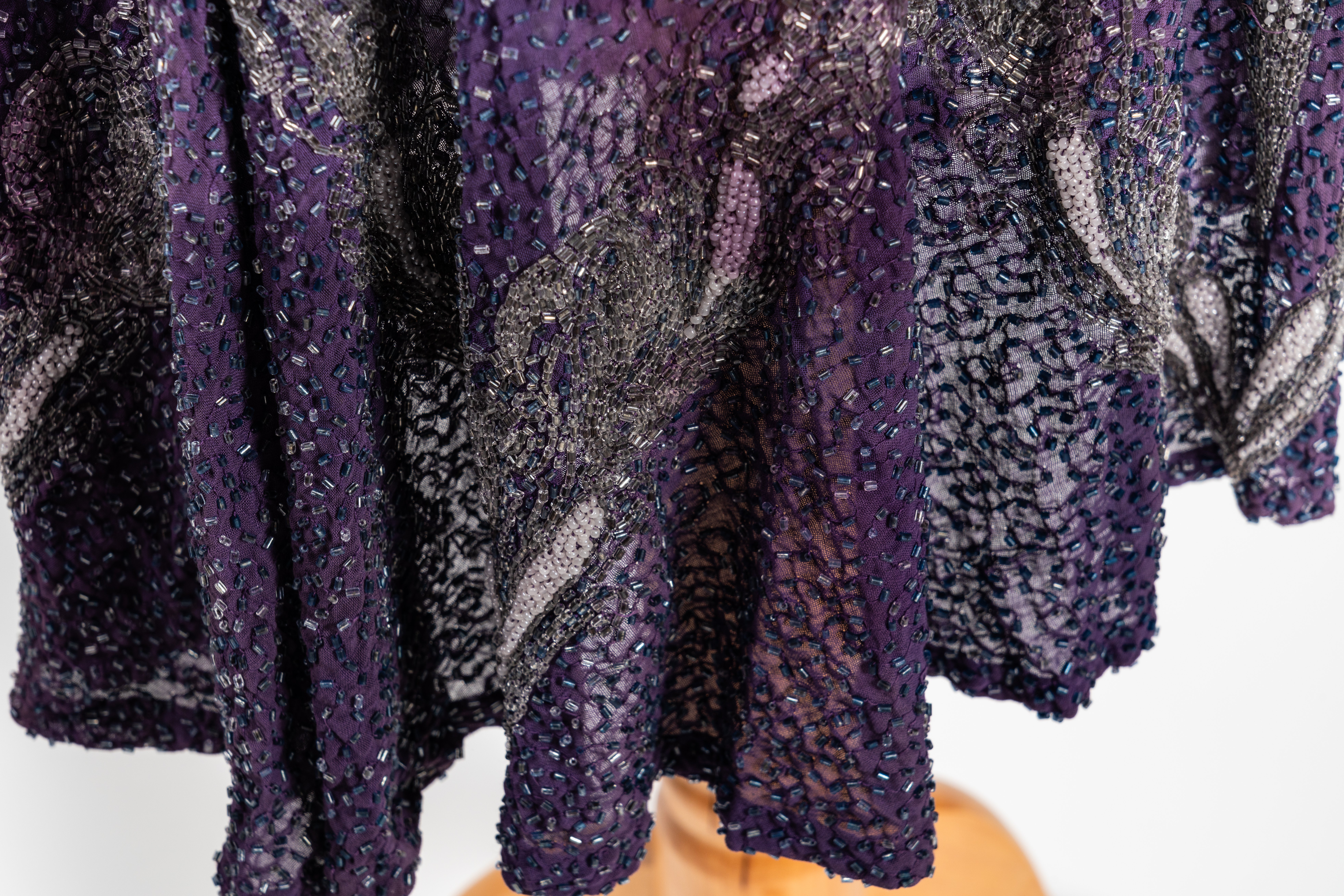 AN ART DECO PURPLE CHIFFON AND BEADED FLAPPER DRESS - Image 9 of 14