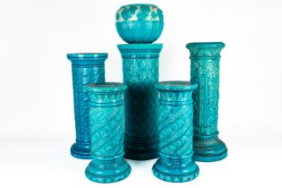 A SMALL PAIR OF BURMANTOFTS FAIENCE TURQUOISE GLAZED CYLINDRICAL PEDESTALS (6)