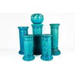 A SMALL PAIR OF BURMANTOFTS FAIENCE TURQUOISE GLAZED CYLINDRICAL PEDESTALS (6)