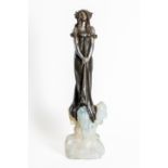 JULIEN CAUSSE (FRENCH 1869-1914): AN ART NOUVEAU SILVERED AND PATINATED BRONZED SPELTER FIGURE...