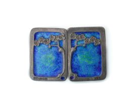 A SILVER AND ENAMELLED TWO PIECE RECTANGULAR WAISTBELT BUCKLE